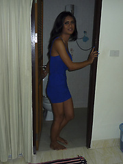 Dark skin femboy Chocolate takes amateur pics in her room